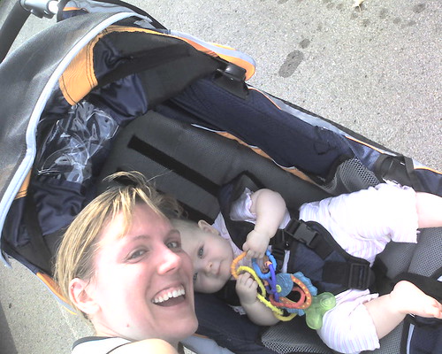 8 mos - Me: hot and sweaty after a run. Claire: chillin' in the jogging stroller