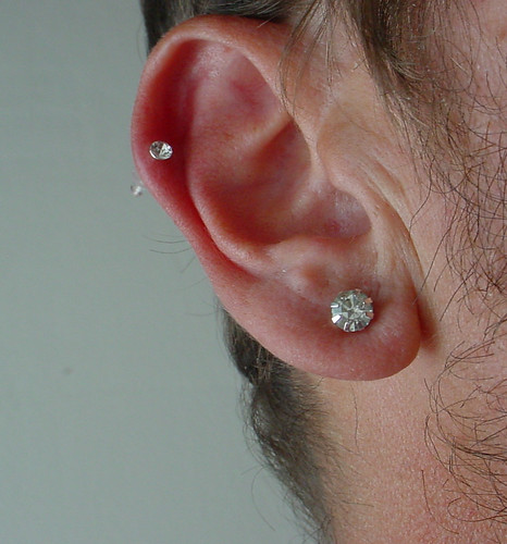 male ear piercing. My right ear piercing