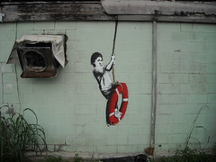 Banksy - New Orleans - A Reminder of Our Slowing Recovery