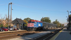 Westbound Metra commuter local arriving at the Mont Clare station. Chicago Illinois. October 2008.