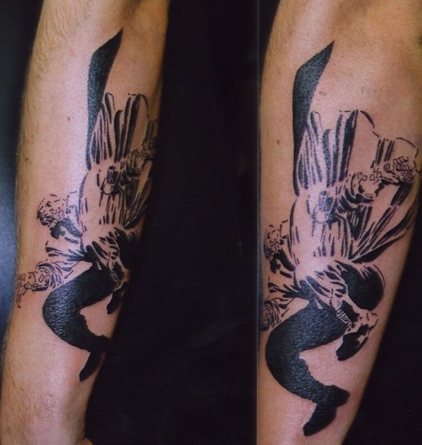 a tattoo of marv from sin city graphic novels done by russell at bizarre ink 