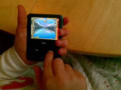 E trys her hand at iPod peggle