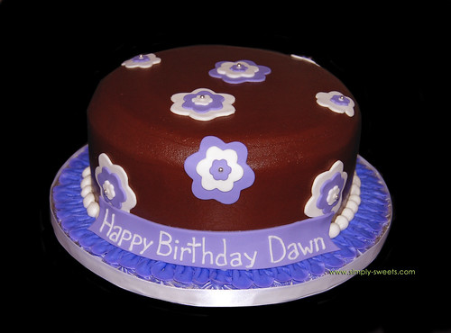 purple white and brown birthday cake