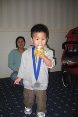 Enjoying my finishing banana and medal