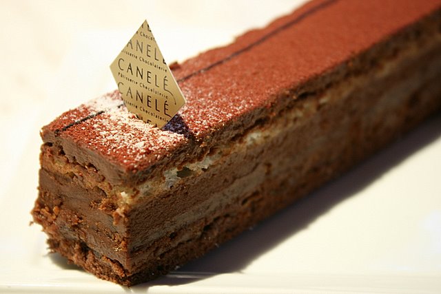 Le Royale - Chocolate mousse 66% layered with hazelnut feullitine, almond success and chocolate genoise with rum