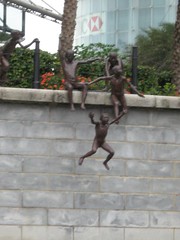 Statue of boys jumping in the river