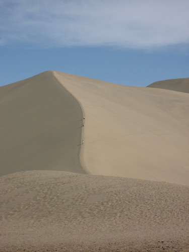Someone climbing the dune