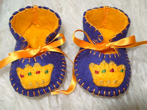 ROYAL BLUE AND GOLD HANDMADE BABY BOOTIES WITH CROWN MOTIFS by Funky Shapes