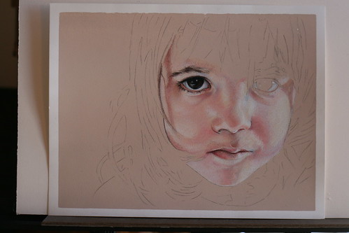 Photo of in progress and as yet untitled colored pencil portrait of my daughter.