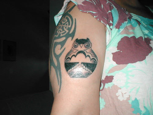 Tattoo Design Tribal Owl Tattoo painted on arm