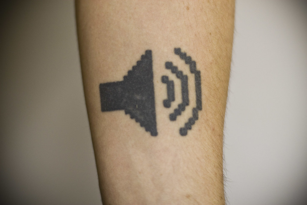 I always wanted a musical tattoo, and the audio out icon on my 266Mhz G3 