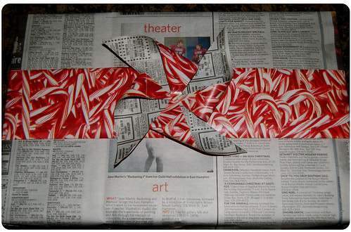 d.i.y. newspaper wrapping paper with pinwheel bow