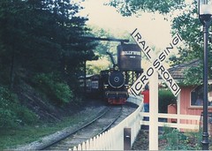The Dollywood Express waiting at the station. Dollywood Amusement Park. Pidgeon Forge Tennesee. May 1990.