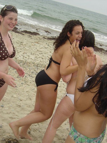 Jane and friends in bikinis on the beach