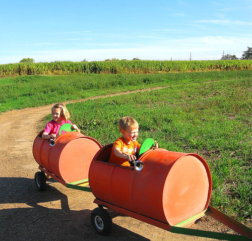 kids pumpkin ride by T. Scharnberger