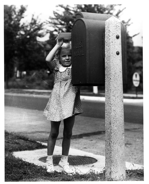 Girl Mailing a Letter
