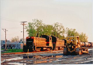 Rare photo! Eastbound Indiana Harbor Belt t switching train approaching South Lawndale Avenue near West 49th Street. Chicago Illinois. May 1990.