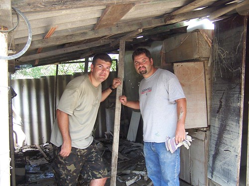 Greg and Conor after they cleaned out this shed