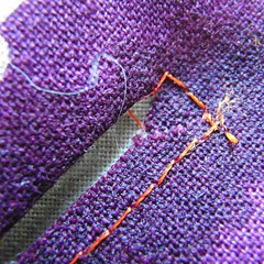 close up of pressed under zipper opening