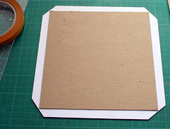 Cutting the corners of the patterned paper