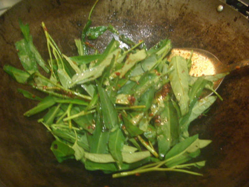 Stir frying kangkung