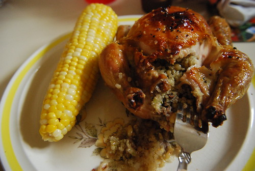 Wee hen with quinoa stuffing and corn