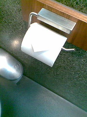 Folded birthday toilet paper at work by itskatelliott