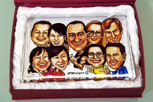 Group caricatures for JP Morgan on crystal plaque 1