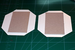 Cutting the patterned paper's corners for the cover