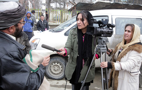 Afghan female journalists at work in Kabul. Women in Afghanistan are braving 