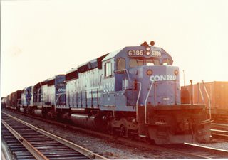Eastbound Conrail freight train at sunset in the Burlington Northern RR Clyde Yard. Cicero Illinois. June 1983. by Eddie from Chicago
