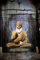 Banksy's beaten up Buddha