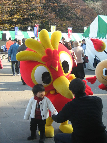 Little kid and mascot at Ueno Park