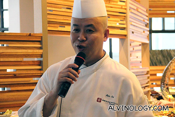 Straits Cafe head chef greeting everyone