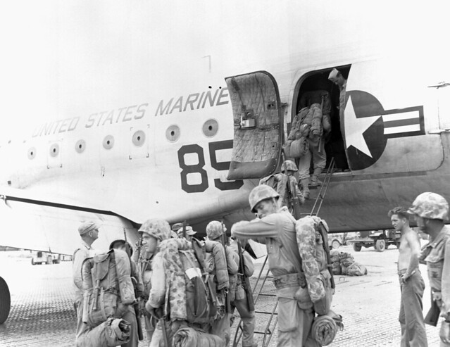 Korean War - 127-GK-1-A132143 Marines from the United States load aboard planes to be flown to the First Marine Division in Korea by US Army Korea - IMCOM