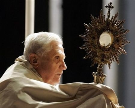 Pope Benedict XVI holding the Eucharist by Christus Vincit