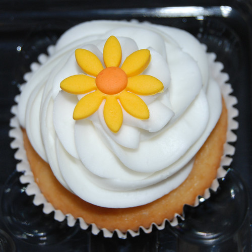 red, orange and yellow Happy Birthday cupcakes yellow flower