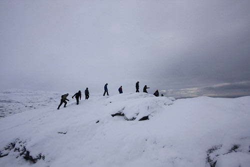 Hiking across a melting glacier overlooking Ilulissat Kangia