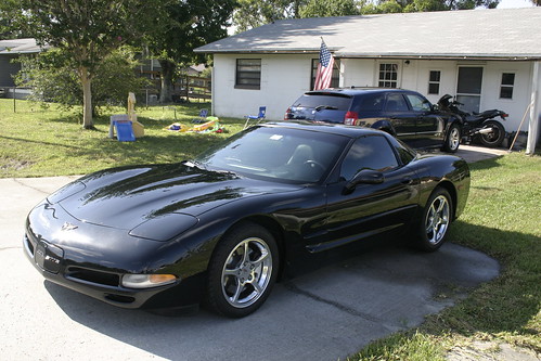  my first Corvette a 2002 Coupe with 42000 miles It's Black with Black 