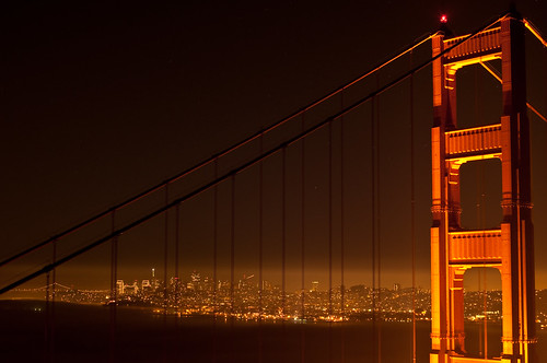 golden gate bridge at night. The Golden Gate Bridge at night, as seen from the Marin Headlands on