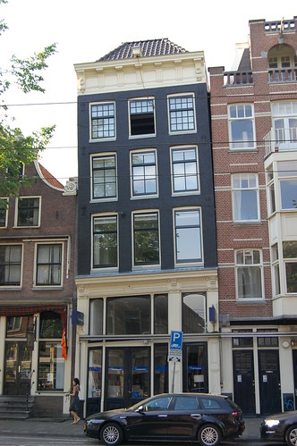 one of many leaning buildings in amsterdam