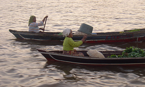 women in klotok boats, kuin river, banjarmasin