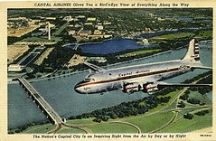 Capital Airlines DC4 postcard, over the George Washington Parkying with the National Mall in the distance