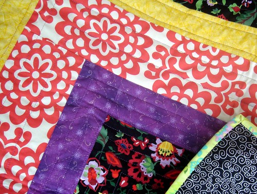bright quilt detail with back and border