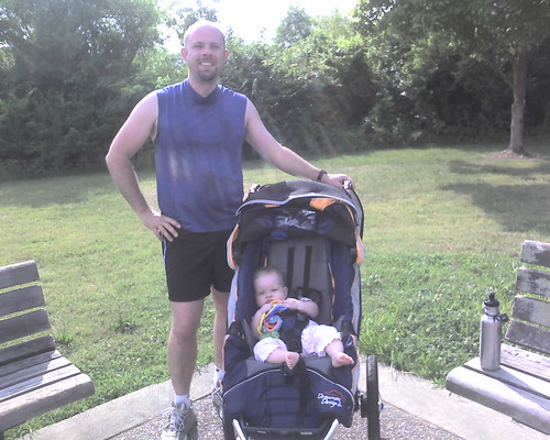 8 mos - Huz: hot and sweaty after a run. Claire: chillin' in the jogging stroller