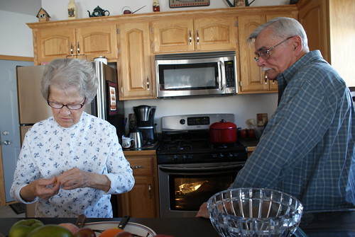 Grandma and Grandpa preparing a Christmas feast