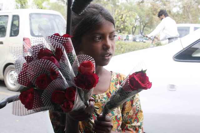 City Moment – The Girl With Red Roses, Near Sai Baba Temple