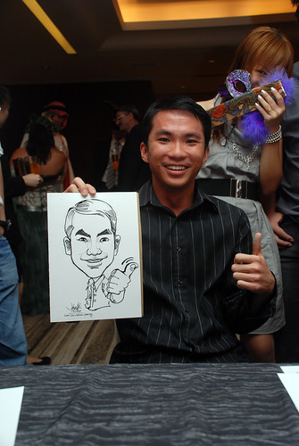 Caricature live sketching for Ezra Holdings 9