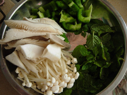 mushroom,green capsicum and mint leaves