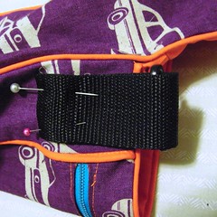 put the single ring on a short strip of webbing and sew down